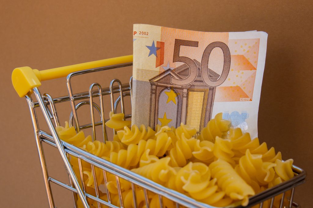 Shopping Trolley Cart Filled With Pasta With 50 Euro Paper Money