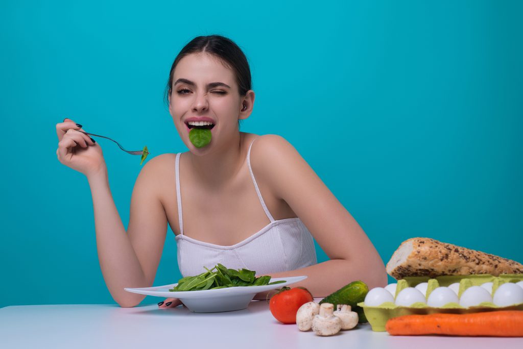 Vegetables Diet. Happy Smiling Woman Eating Healthy Food, Dietin
