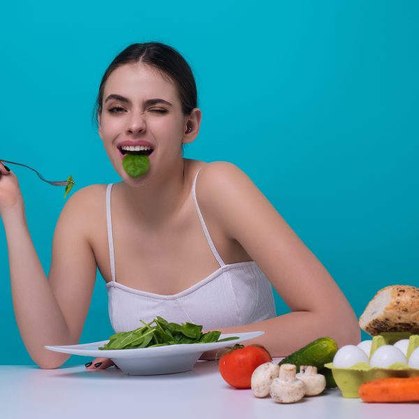 Vegetables Diet. Happy Smiling Woman Eating Healthy Food, Dietin