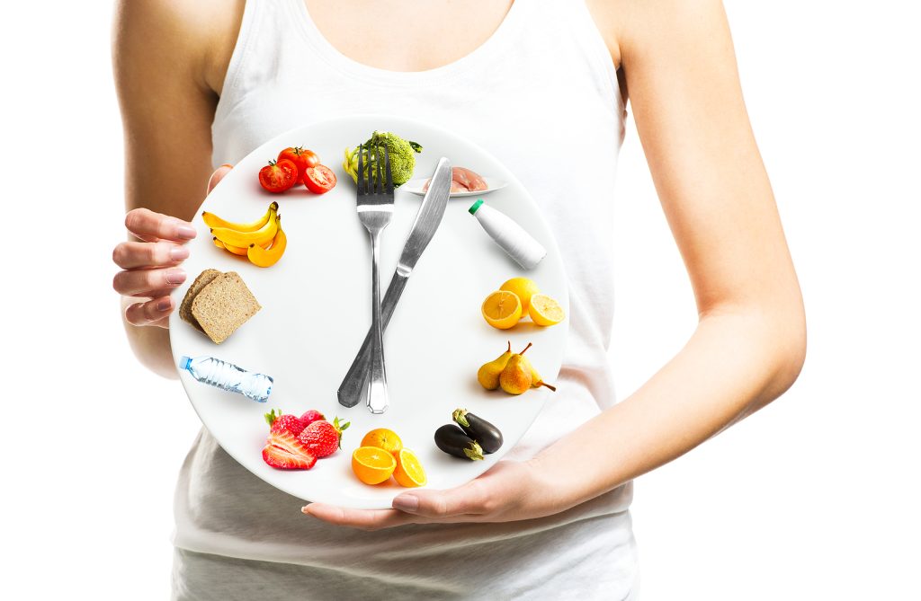 prep meals huddersfield - woman holding a plate with food